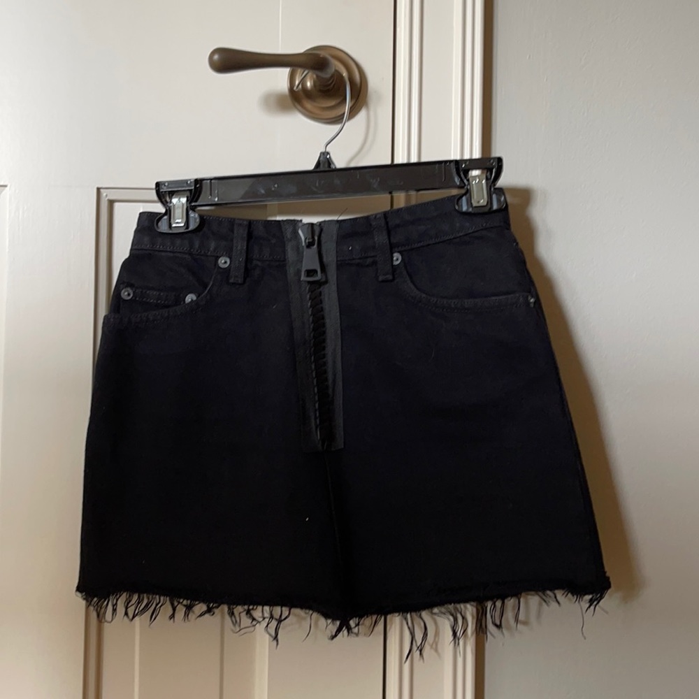 Carmar denim skirt. Basically new. Size 25.